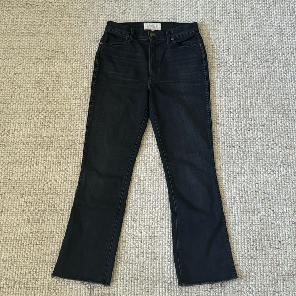 The Great 26 black fitted jeans with a frayed bottom